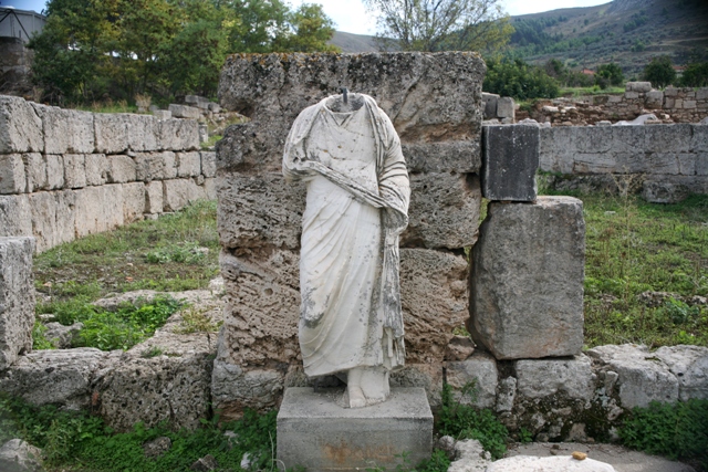 Ancient Corinth - One of many Roman statues in ancient Corinth